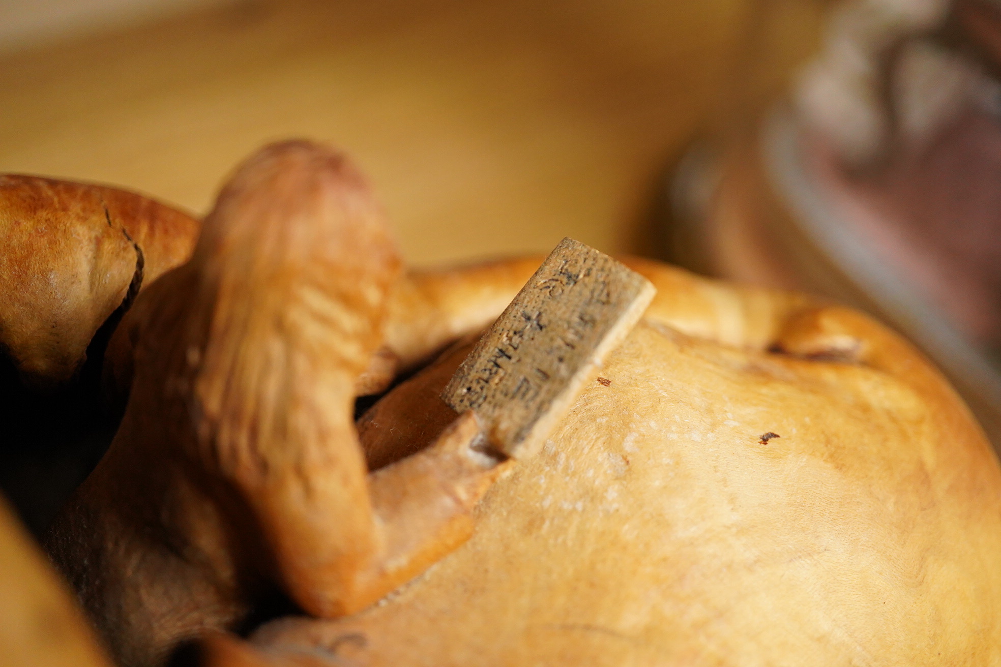 Pierre Decorse (b.1953), a large naturalistically modelled wooden sculpture depicting a figure emanating from a shell-like surround, 22cm high